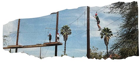 people working together on ropes course