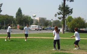 people playing a game on a field