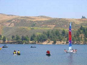 canoes and sailboats on Castaic Lake