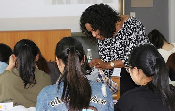shirley warren works with students at Soochow University