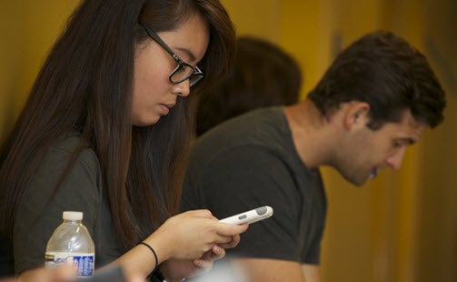 Student using a smartphone