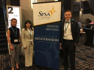 Kimberly Caseres, Michelle Sadigh and Professor Tyler Hughes at the SPSA Conference