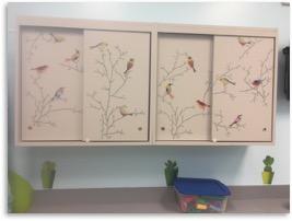 Inside the Play Therapy Room, art wall with birds on branches