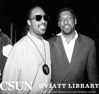 Stevie Wonder and Willis Edwards at the Black Family Reunion Exposition, Los Angeles, 1989.