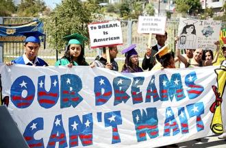 Student protesters with banner:Our Dreams Can't Wait