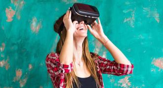 A woman wearing a VR headset. 