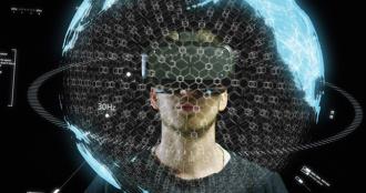 A man using a virtual reality headset. 