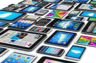 Tablets and smartphones arranged in a collage. 