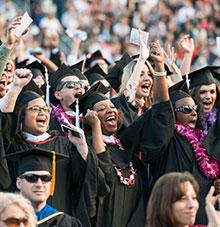 Students cheering at commencement