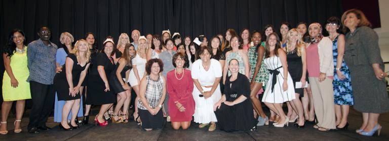 graduates and faculty at 2014 nursing pinning ceremony