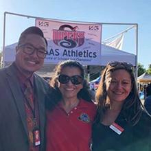 Cat Gaspard with representatives from NAHS at the VAAS school showcase event