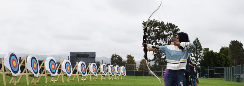 archery students take aim at targets