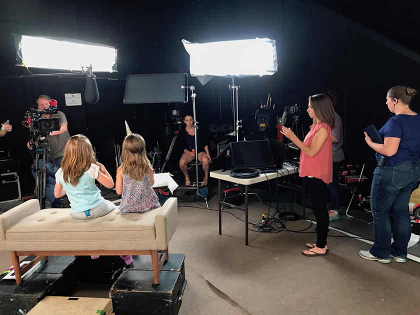 A behind-the-scenes photo from the A&amp;E special Deaf Out Loud features CSUN alumni Sheena McFeely and her husband Manny Johnson, with their daughters, Ivy and Shaylee. Photo courtesy of Sheena McFeely.