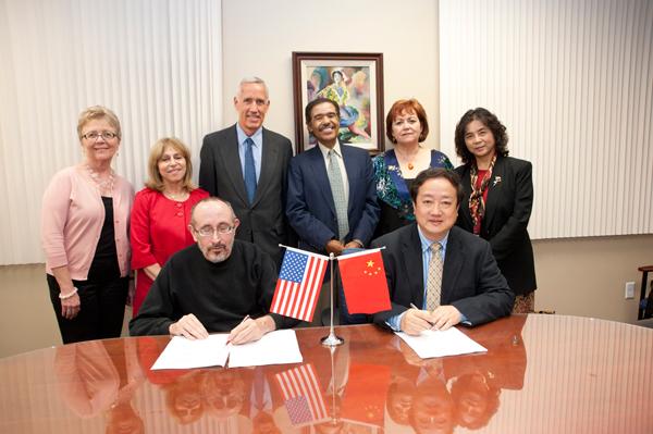 group shot of representatives from signing the agreement