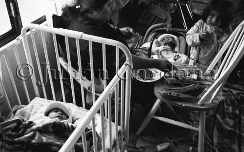 Celerina Vargas at her home in Eureka, California with her American-born children Estrellita (far left), Odilia, and her five-month-old niece, Joselyn. Celerina has five children, three of them born in México.