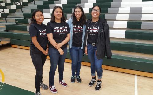 Four newly accepted Cohort 2 B2F Scholars wearing their black B2F T-Shirts in CPHS Gym. 