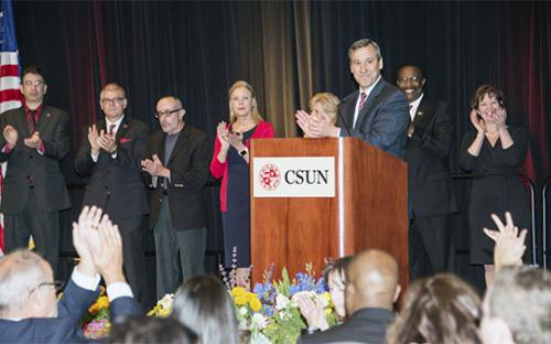 Vice President Rob Gunsalus announcing the 2015 Alumni Relations Award.