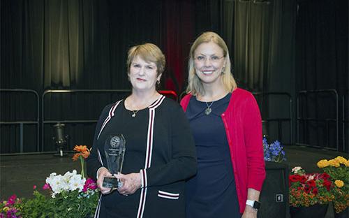 2015 Presidential Award Recipient Barbara Hlinka (Institutional Research) with President Dianne F. Harrison.