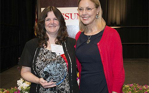 2015 Merit Award Recipient Kathleen Pohl (College of Engineering &amp; Computer Science) with President Dianne F. Harrison.