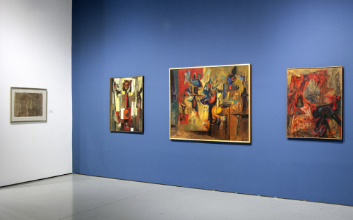 Install image of the Main Gallery front room, three Hans Burkhardt paintings