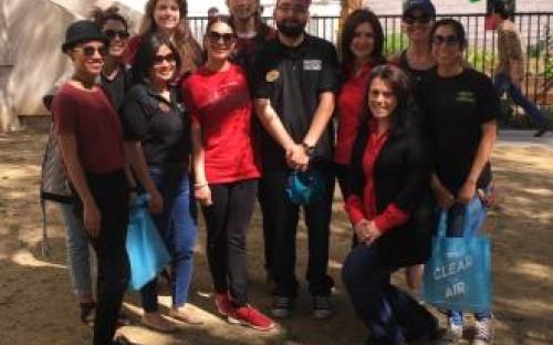 Group picture in front of the Marilyn Magaram Center garden