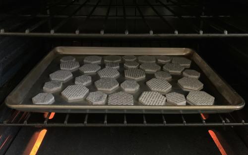 Alexis Ramos fires ceramic tiles in her home oven