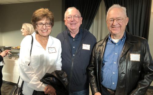 Alumni mingling at the English Alumni Faculty Lecture Series