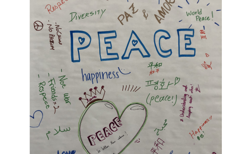 IESC Coffee Hour: International Day of Peace, board with peace message written by students