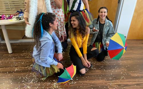 IESC Coffee Hour Brazilian Carnival: Students laughing 