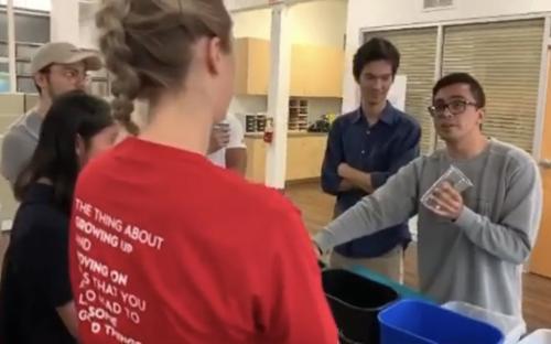 IESC Coffee Hour: Sustainability, students playing a recycling game