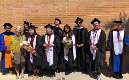 Hooded Graduates and Faculty