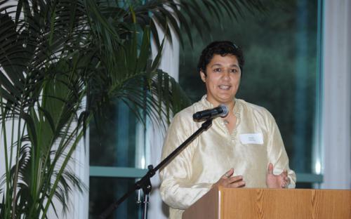 Professor Sheena Malhotra at podium