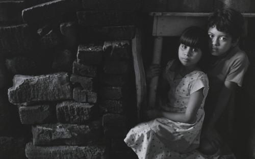 Children hiding, Nicaragua, 1979.