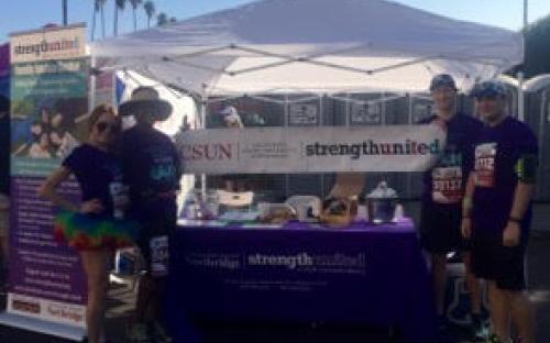 Team members represent Strength United at their allocated booth.
