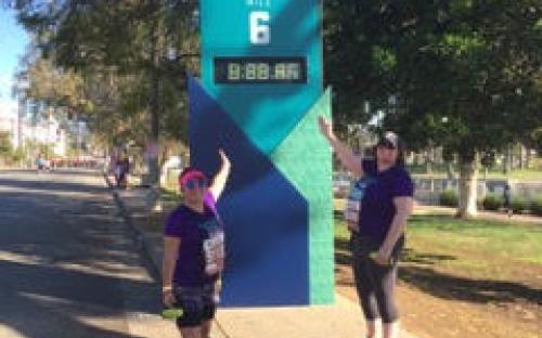 Strength United Team members proudly show off their running time.