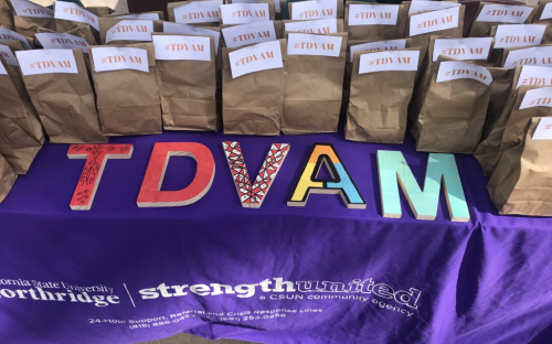 Table with bags at Teen Dating Violence Awareness Month