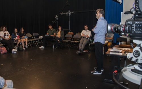 Roger Young addressing students during TV DIRECTING WORKSHOP on the TV stage.