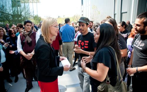President Dianne F. Harrison speaks with additional students on her first official visit to CSUN.