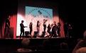 10 Students of Teenage Drama Workshop in action on stage for the comedy improv night