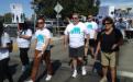 A group of people walking for domestic violence rally