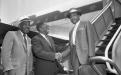 Dr. Martin Luther King Jr., George Beavers Jr., Harold Scott, at airport, ca. 1960