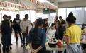 IESC Coffee Hour Lunar New Year: students interacting with other students