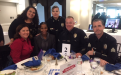 People gathered around a table at the LAPD Chief &amp; Captain&#039;s Luncheon