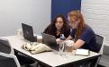 Students working on a digital editions of a thirteenth-century manuscript