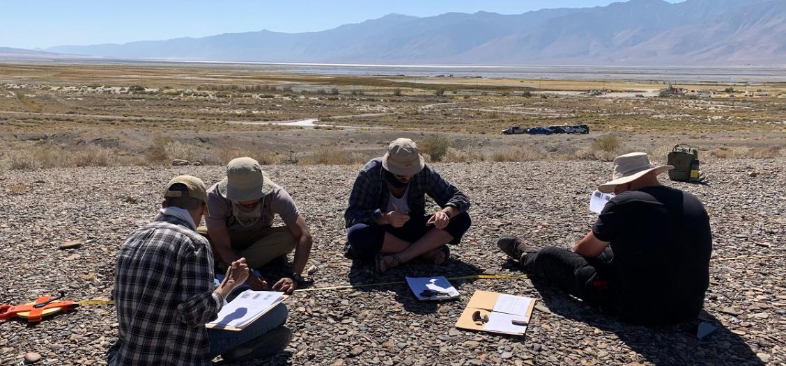 Students taking measurements at the Beach