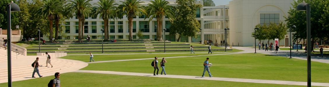 Students walking to and from Oviatt Library across Sierra Quad