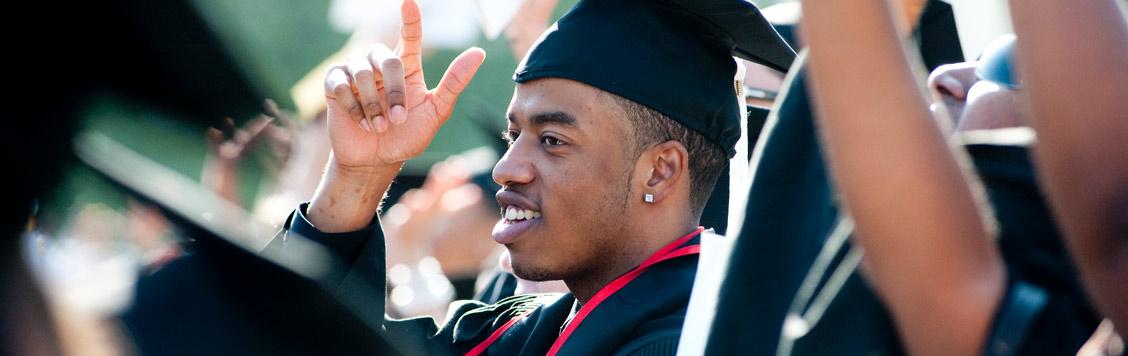 African American male student celebrating at CSUN&#039;s Graduation.