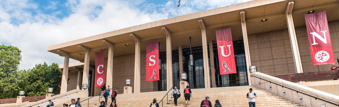 Students walking up the Oviatt Library Steps.