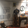 Apartheid to Today exhibit, with an academic poster and items from South Africa