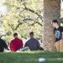A group of students sitting in front of Oviatt Library